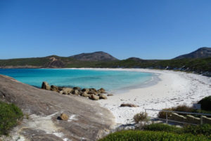 white sandy beach blue aqua sea cape le grand motorhome hire