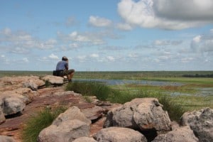 man by the floodplain Ubirr Kakadu view