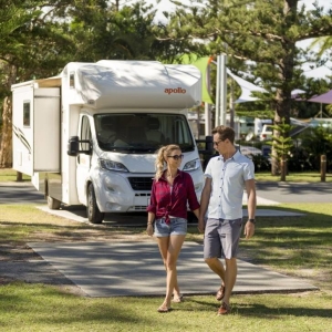 Apollo Campervan and Couple walking